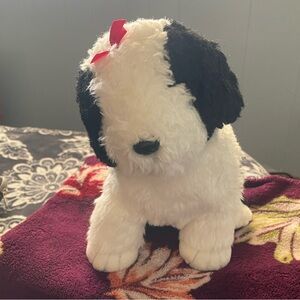 Plush Black & White Puppy Toy with Red Bow her name is Poofie